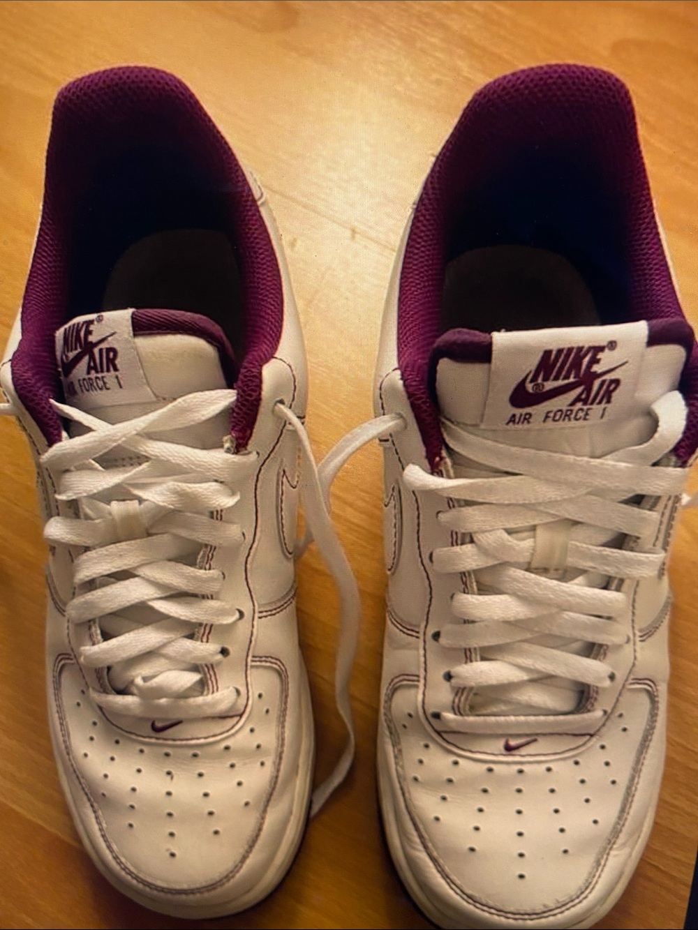 Nike Women’s White Sneakers with Purple Lining
